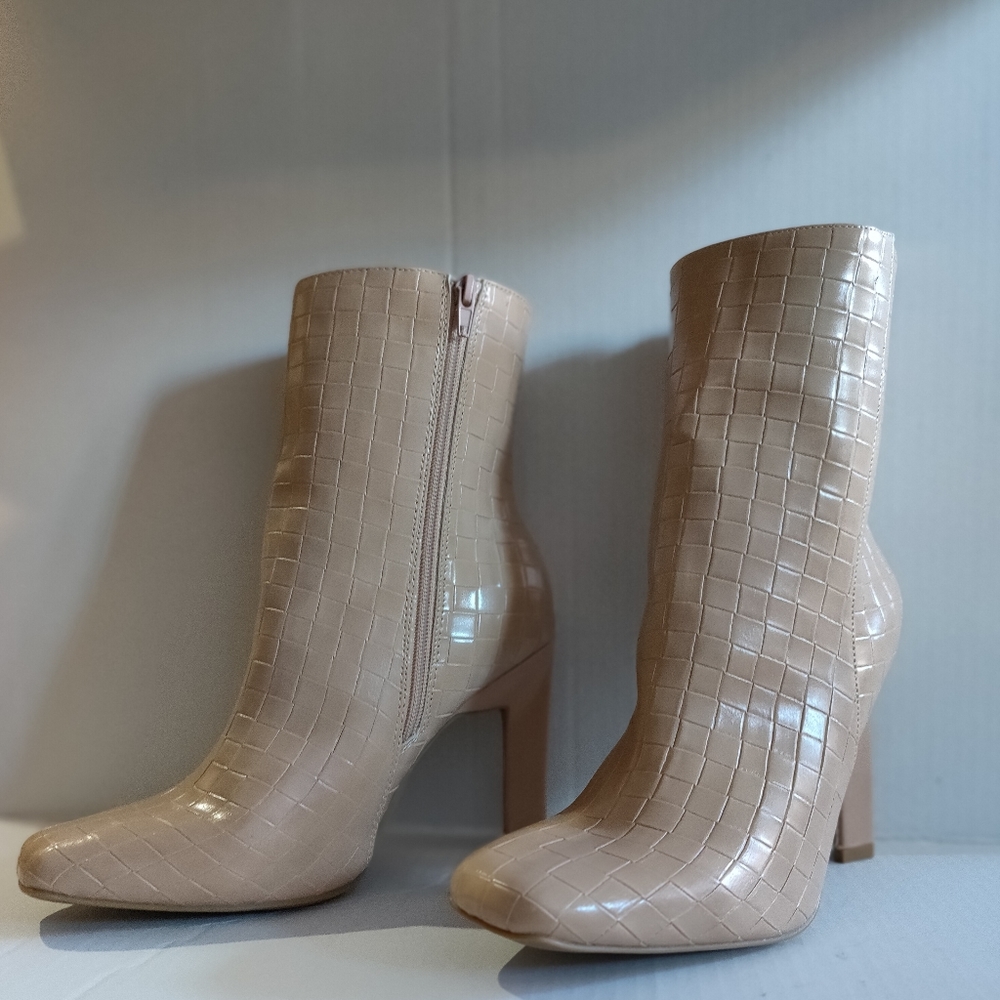Cream colored heeled booties